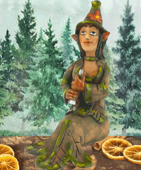 Waldfee Elfie mit Zauberflöte - sitzend